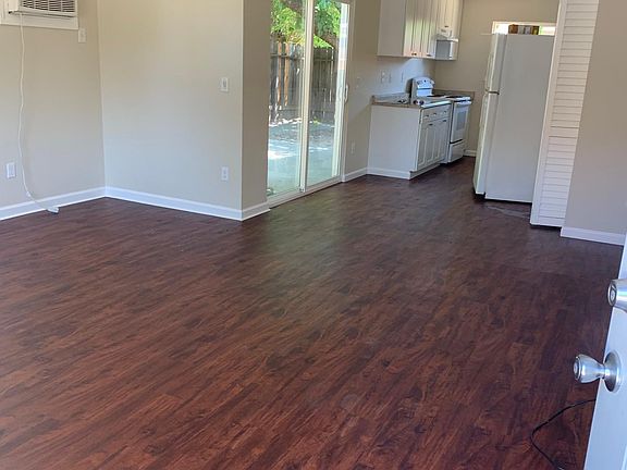 Main Living room (Fridge is moved out in the picture and is blocking the view of the kitchen)