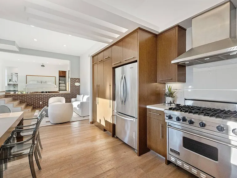 Embrace culinary excellence in our modern kitchen, equipped with high-end appliances and sleek design.