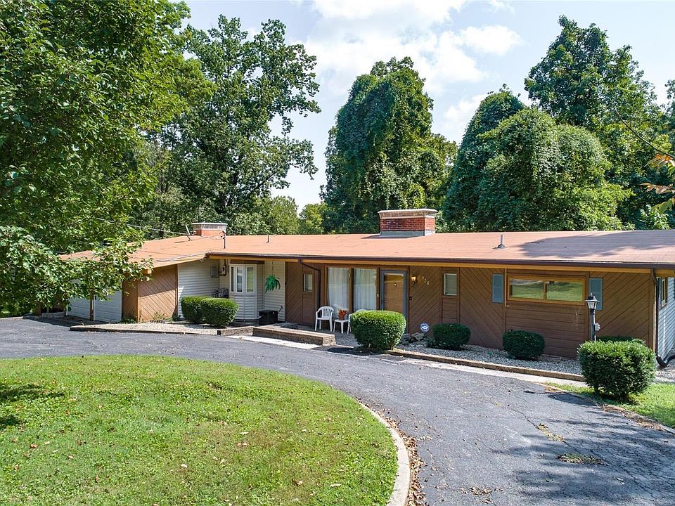 Welcome to 1.5 acres near the heart of everything!!  This unique home was built after the war and the homeowner drew his plans based on a Better  Homes and Gardens house floor plan!