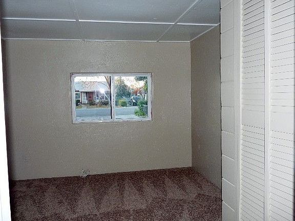 Converted garage with small closet (permits unknown)