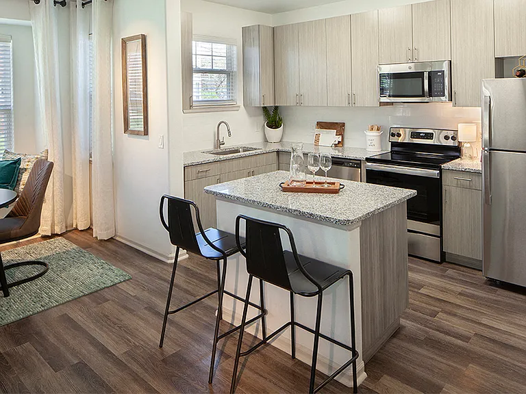 Contemporary kitchens feature stainless steel appliances and USB charging ports