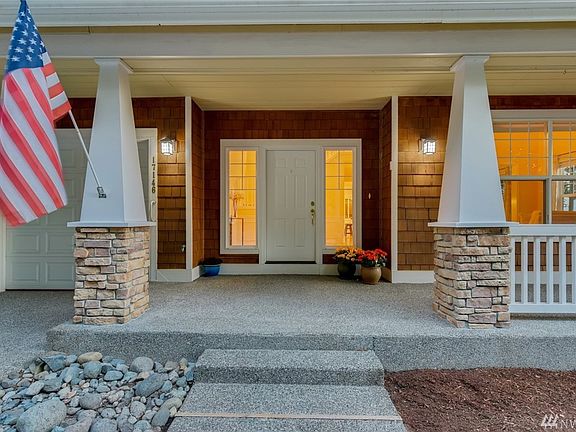 Front entrance with full length sidelights opens to two-story foyer. Recent updates include newer water heater, low-E windows and air conditioning!
