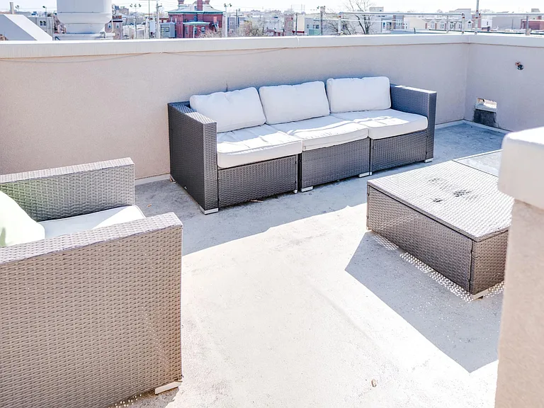 Private rooftop deck with plenty of space for seating