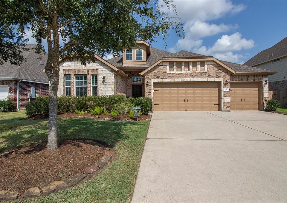 3-Car Garage and nice triple wide driveway!
