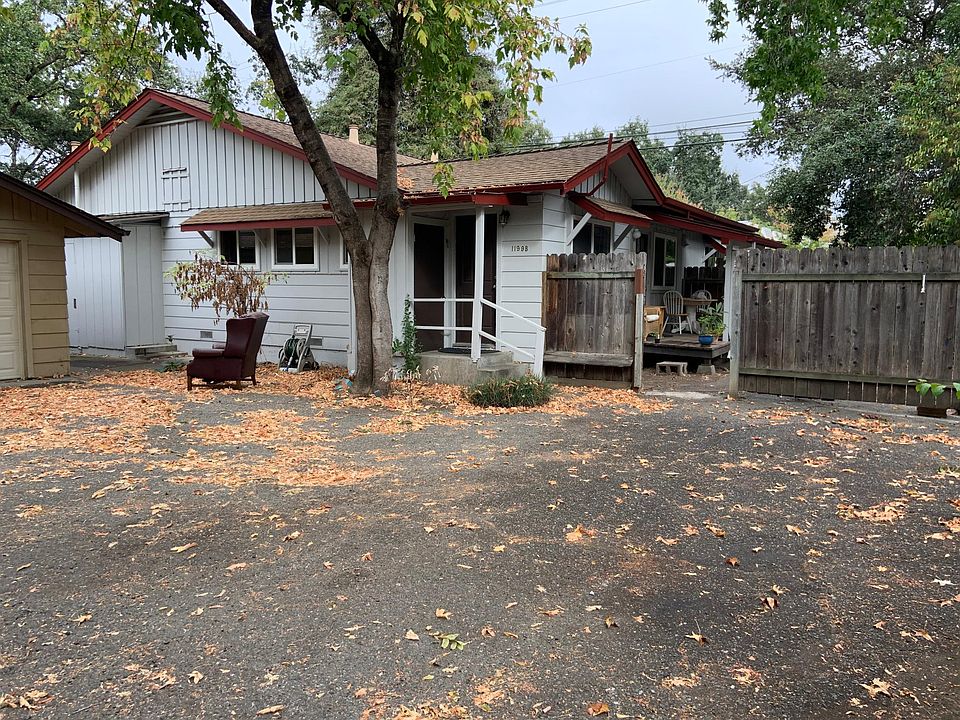 "Front" of apt, backyard, entrance to kitchen, gate to side yard.
