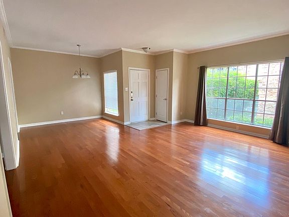 Living/dining area (Front door and coat closet)