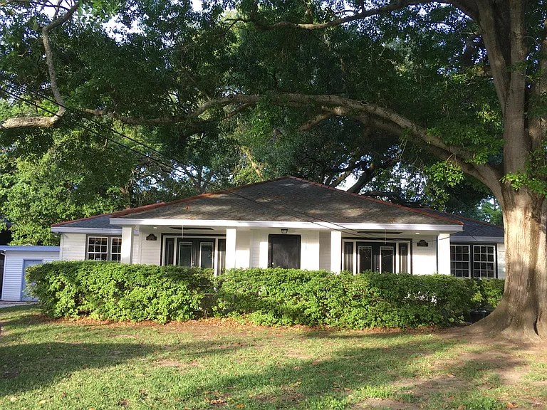 Front yard of 125A and 125B. 125A is 1 BR 1 BA that is rented.