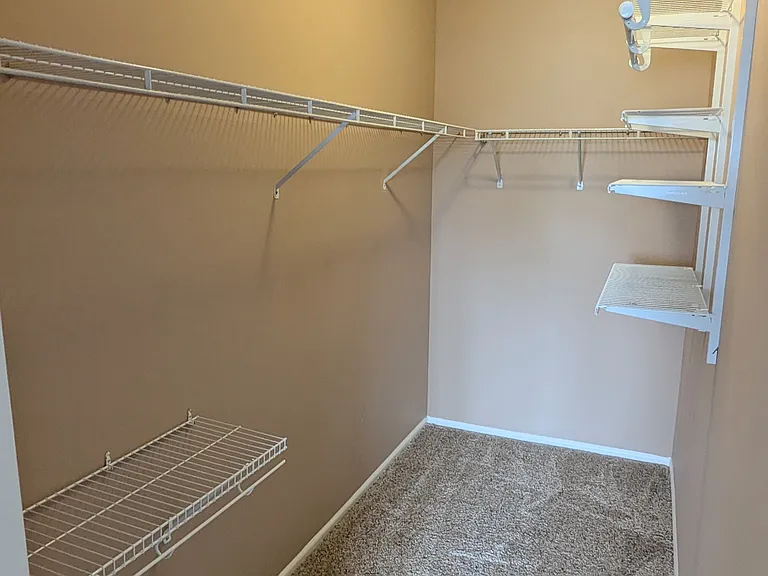 Walk-in Closet with shelves, in Master Bedroom