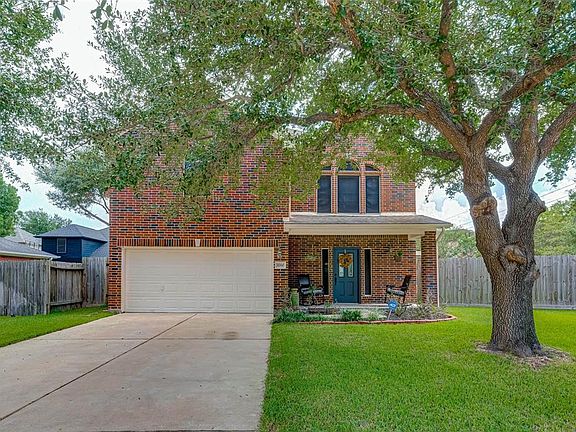 Notice the large oak tree in the front yard to give you afternoon shade while you sit on the front porch.
