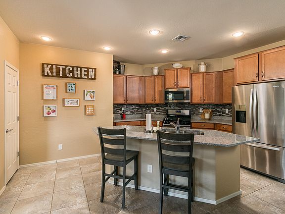 5th image of 9546 W Whispering Wind Dr