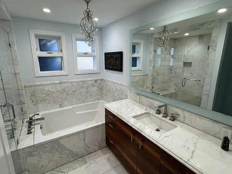 All marble master bath with spa tub and heated floors