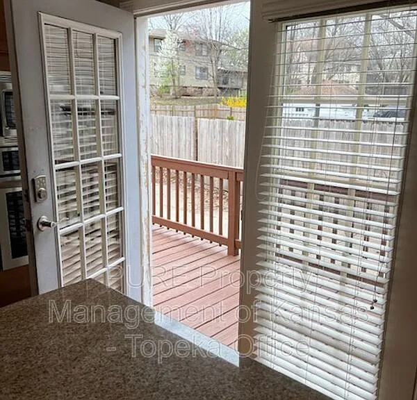 429 E 63rd Ter — Photo 26