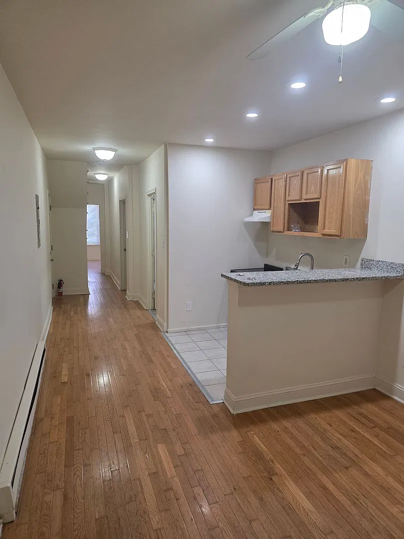 Two-Level 3-Bedroom Apartment | 1234-40 Rising Sun Ave — Photo 1