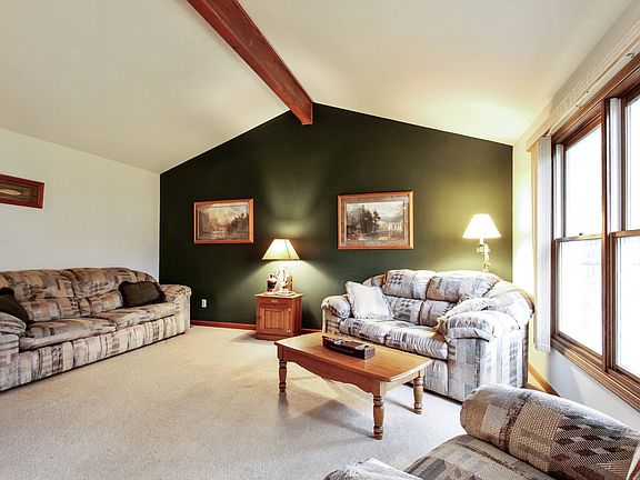 Living Room Features Vaulted Ceilings and a Roughed-in area for a Fireplace.