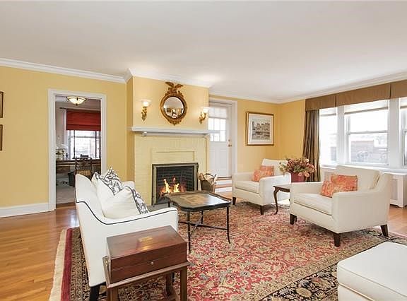 Inviting Living Room equipped with wood burning fireplace. Private terrace can be accessed from living room. In addition, privat