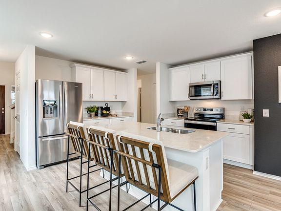 Spacious kitchen with recessed lighting