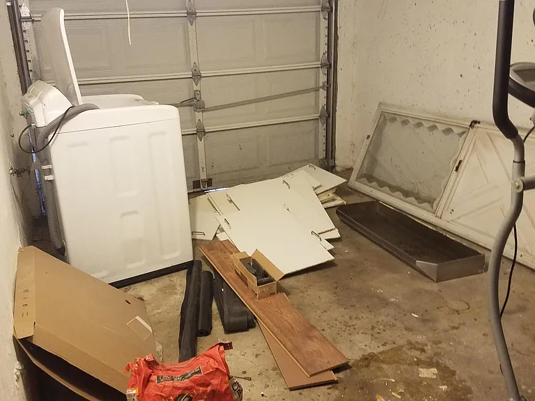 Garage to be cleared. New washing machine to be installed