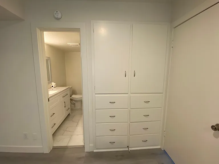 Built in drawers and cabinet inside bedroom