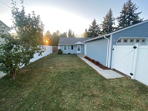 Your front yard view, your detached garage, private, fence line in all directions, no view of your neighbors! An additional gate divides your front yard from your back yard!