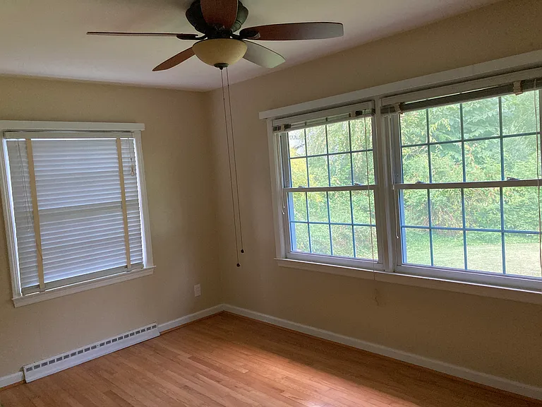 2nd Bedroom - windows look to the side and the backyard.