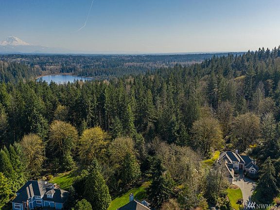 Home sits on 1.2 acres adjacent to other exquisite estates and 400+ acres Open Space.