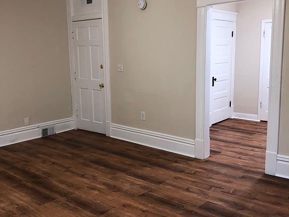 DOOR INTO THE APT AND KITCHEN DOORWAY (Brand new floor)