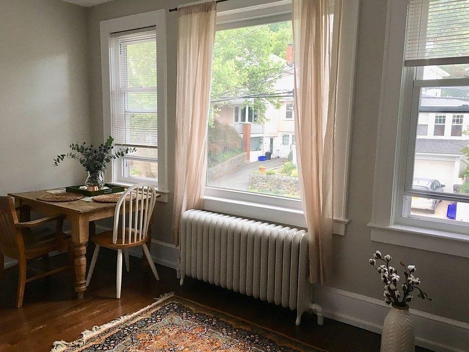 Sunroom in front of home, off the livingi room, can be used as an office or 3rd bedroom