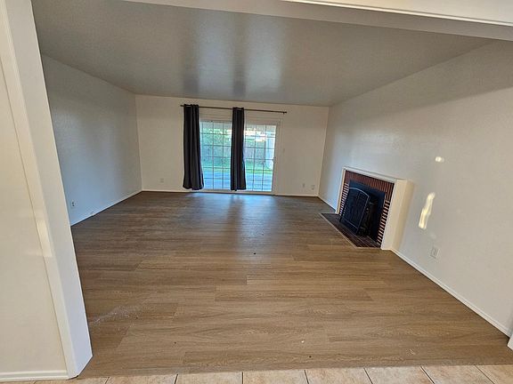 Family room, living room and dining room similar color scheme
