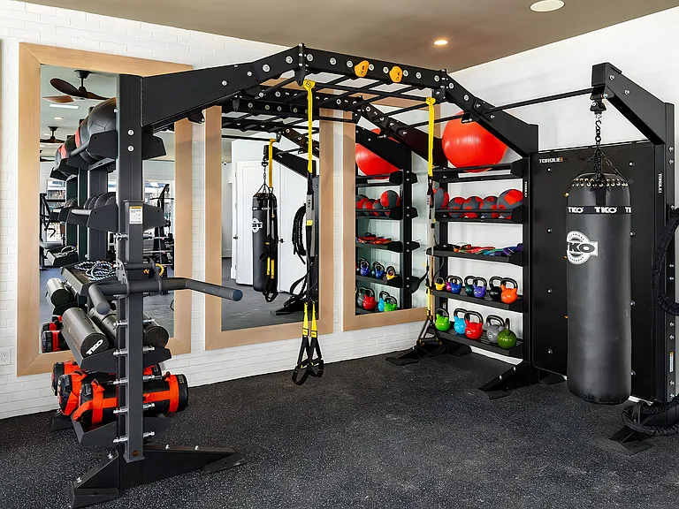 Fully Equipped Fitness Area Featuring Strength & Cardio Stations