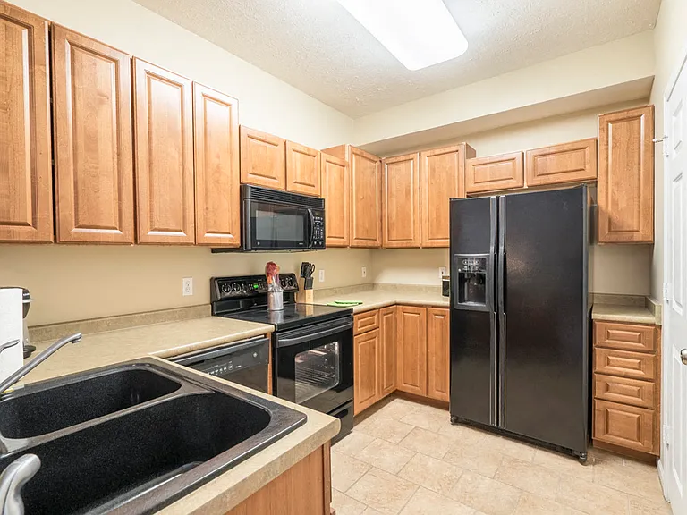 Enjoy a side-by-side fridge with water and ice dispenser.