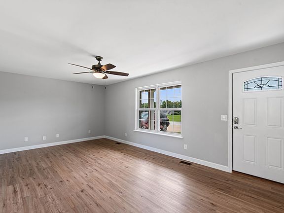 Large open floor plan with fresh updates including LVP flooring