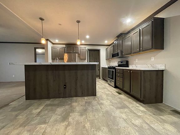 2nd image of 7204 E Grand River Ave Lot 365