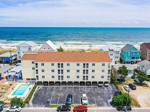 Additional parking is located in front of the building Two parking spaces are included with this unit