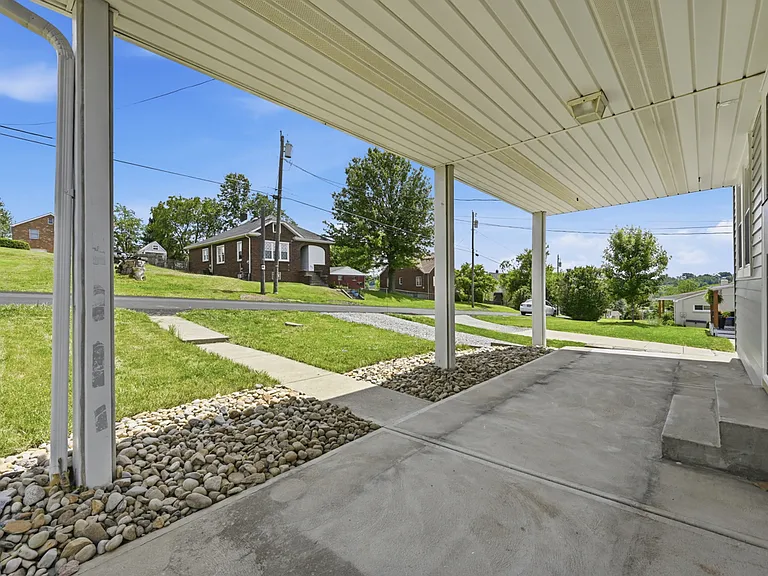 Covered front porch. New landscaping.