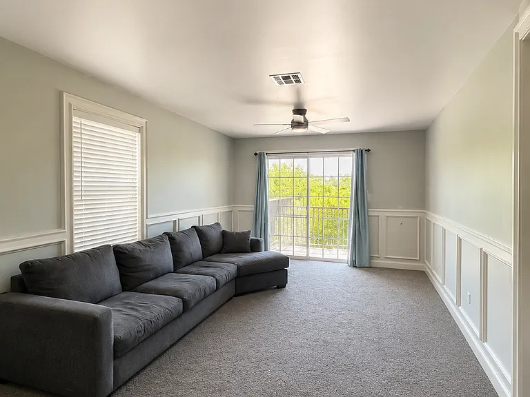 Upstairs living area, w/ sliding door to deck