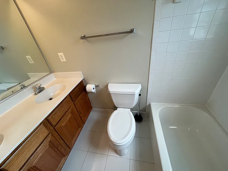 Full bath on front-facing bedroom on second floor