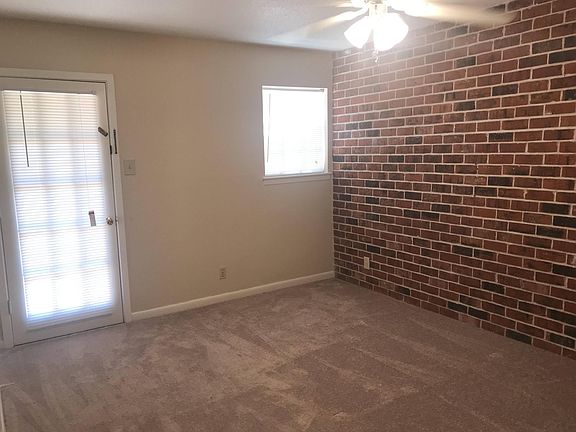 Bedroom with acess to private patio