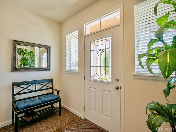 Detailed finishes such as the lead paned front door and sitting area for putting on your shoes.