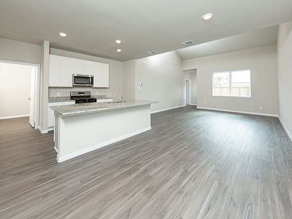 Dining Area to Kitchen and Family Room