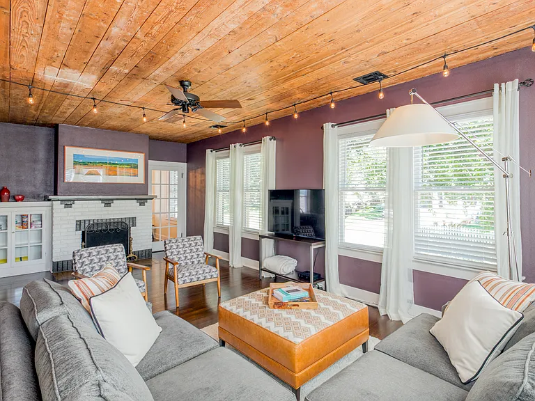 view of the living room, door there leads to the staircase