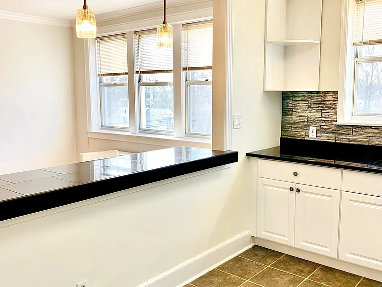 Kitchen opens to living room