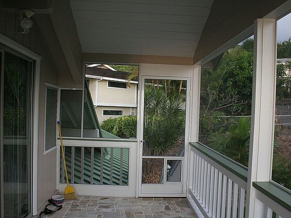 Upstairs studio screened lanai from inside