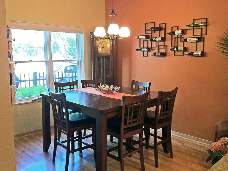 Large bright dining area with square table