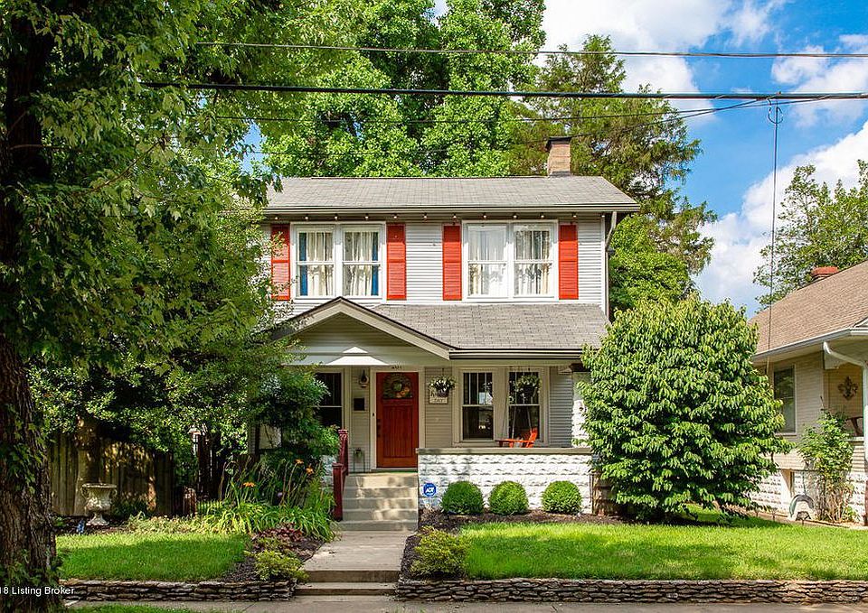The front of the house gets a lot of light and has a relaxing porch swing!