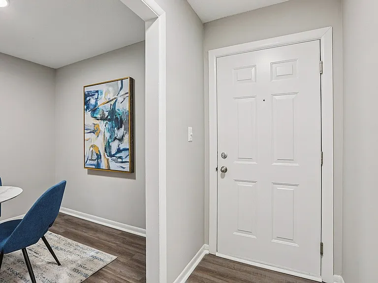 Entryway with hardwood-style flooring
