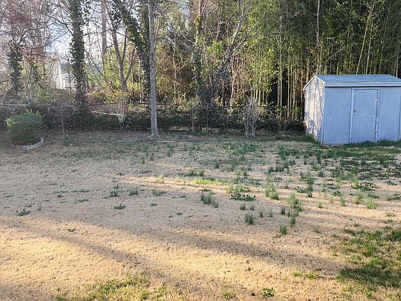 Large Level Back Yard with Storage Shed