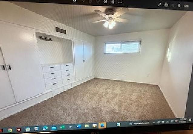 Bedroom With Built in wardrobes and drawers