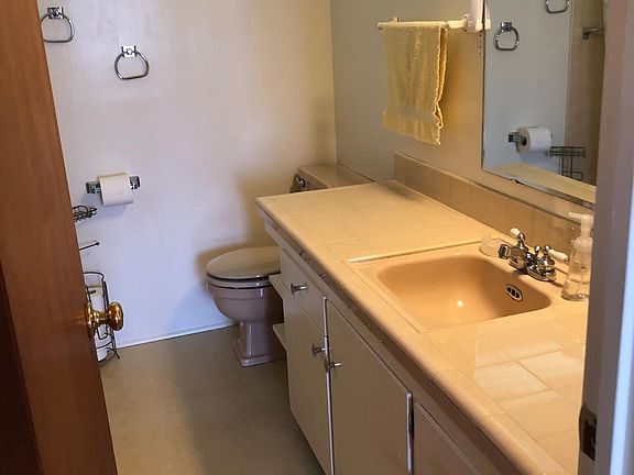 Upstairs bathroom with tub