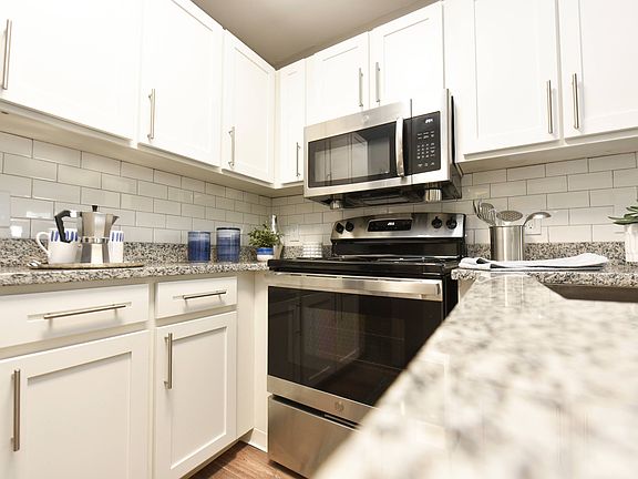 Kitchen with Backsplash + Modern Cabinetry