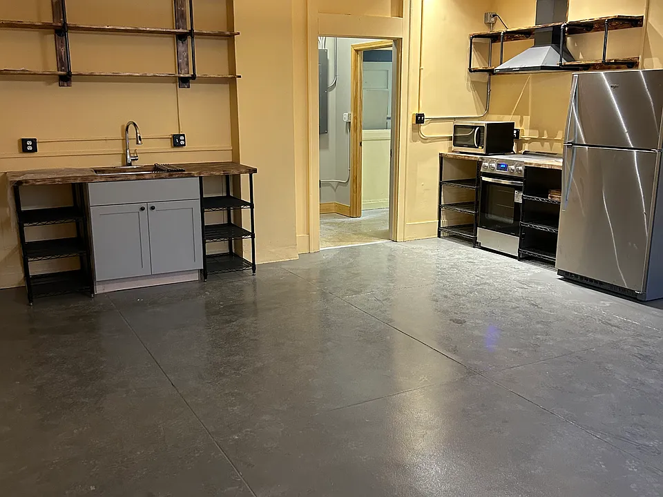 The kitchen/dining room area! Bright with light and opportunities for space.